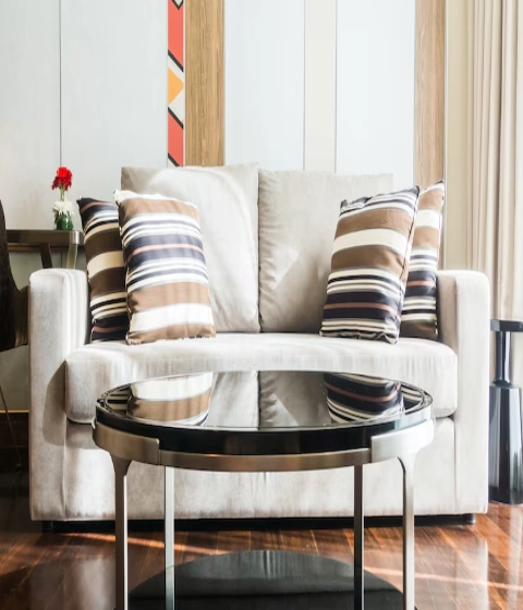 couch-with-cushions-glass-table